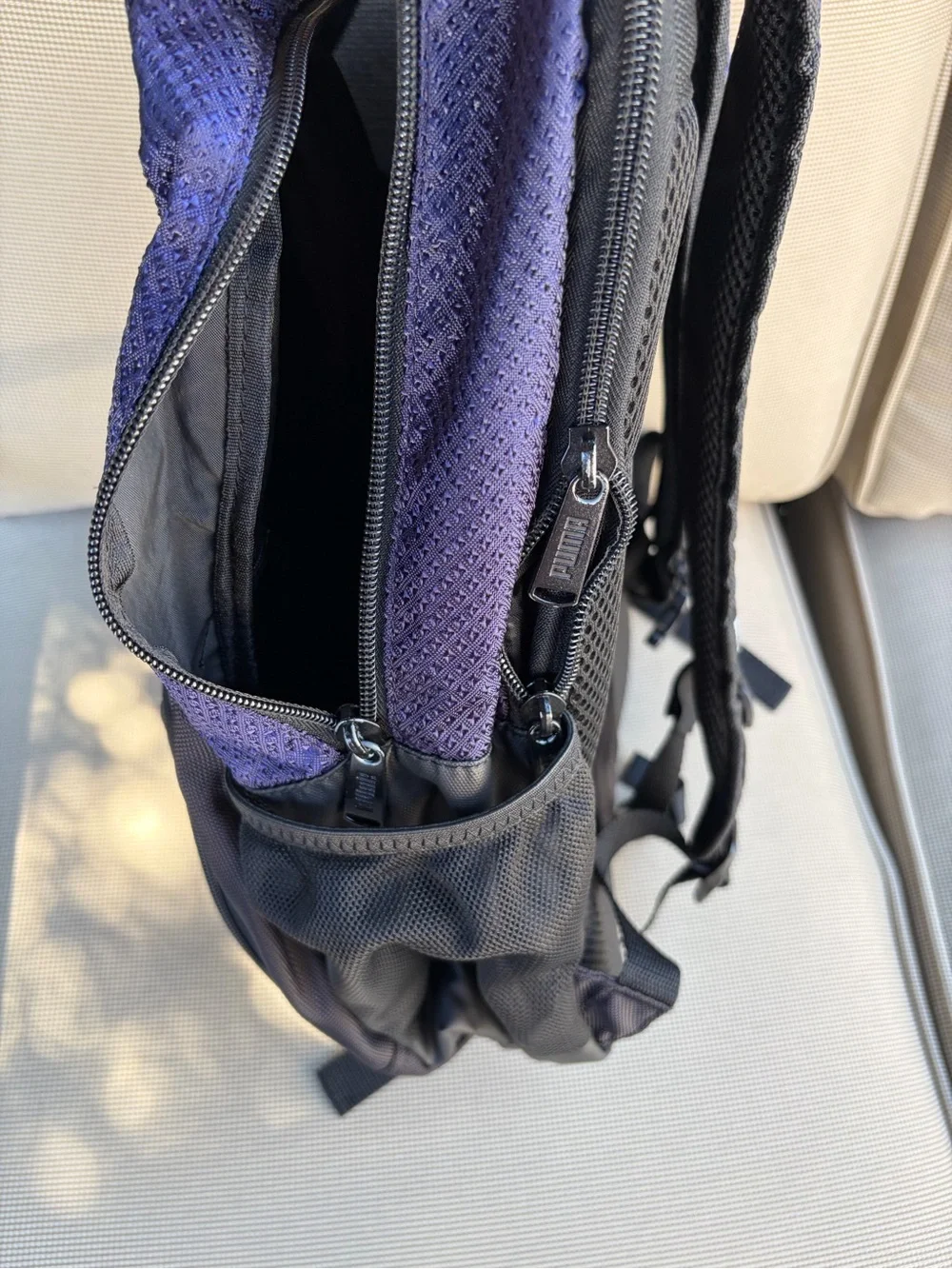 Puma Purple and Black Sports Backpack with White Logo